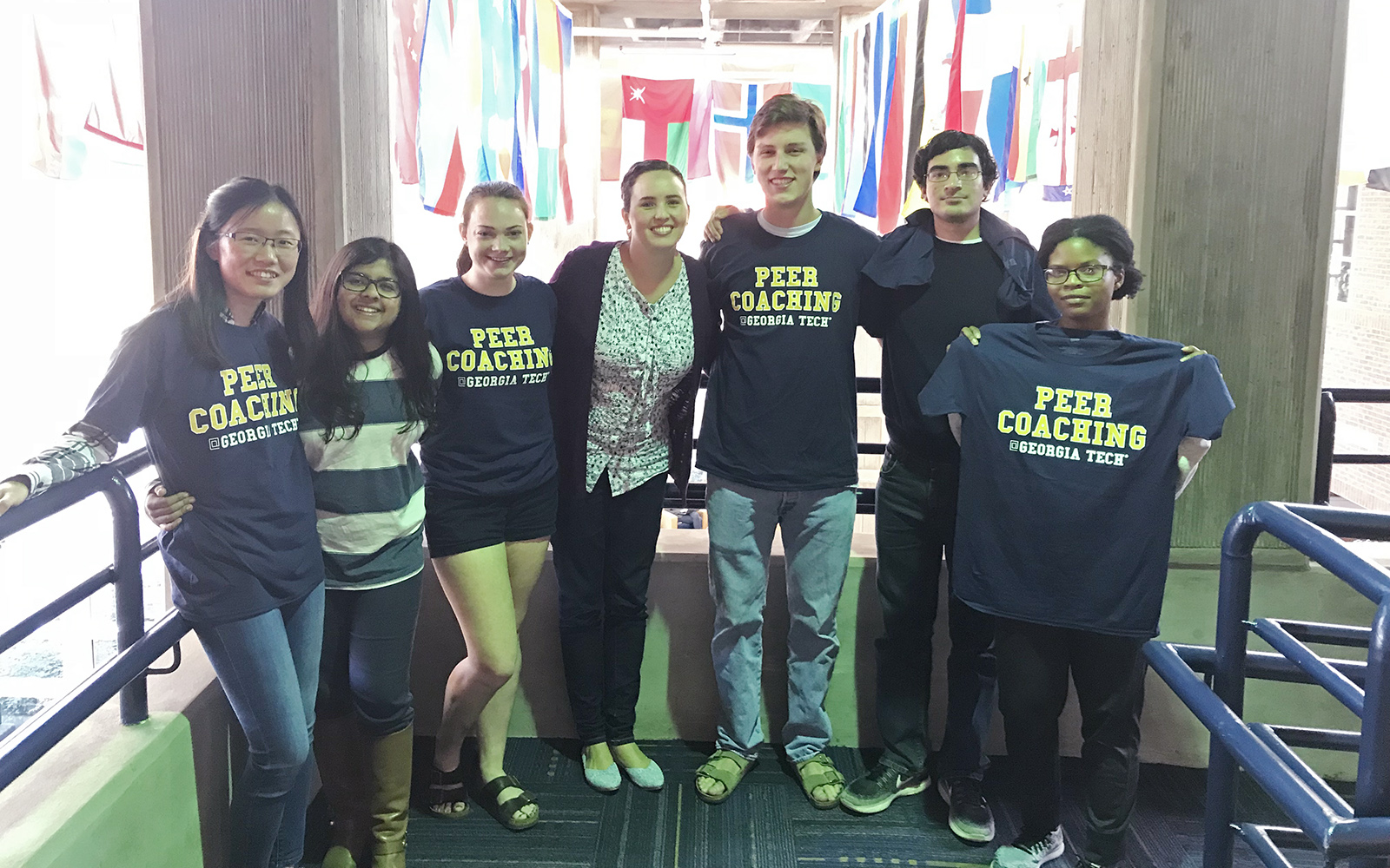 Students in the Smithgall Student Services (Flag) Building after completing their peer coaching training in fall 2017